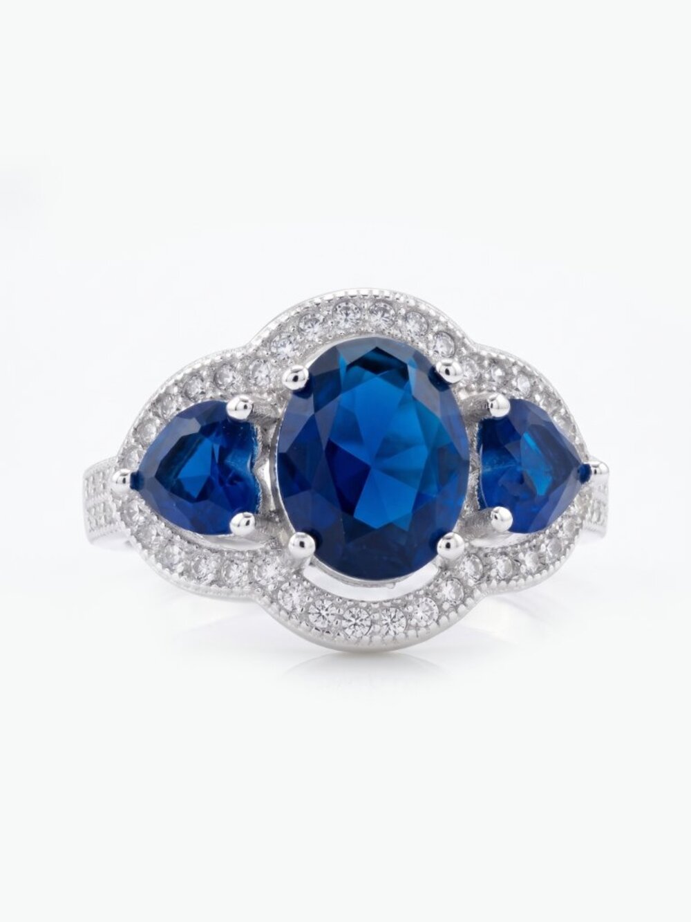 Blue Sapphire three-stone ring with  heart-shaped side stones - 925 Silver